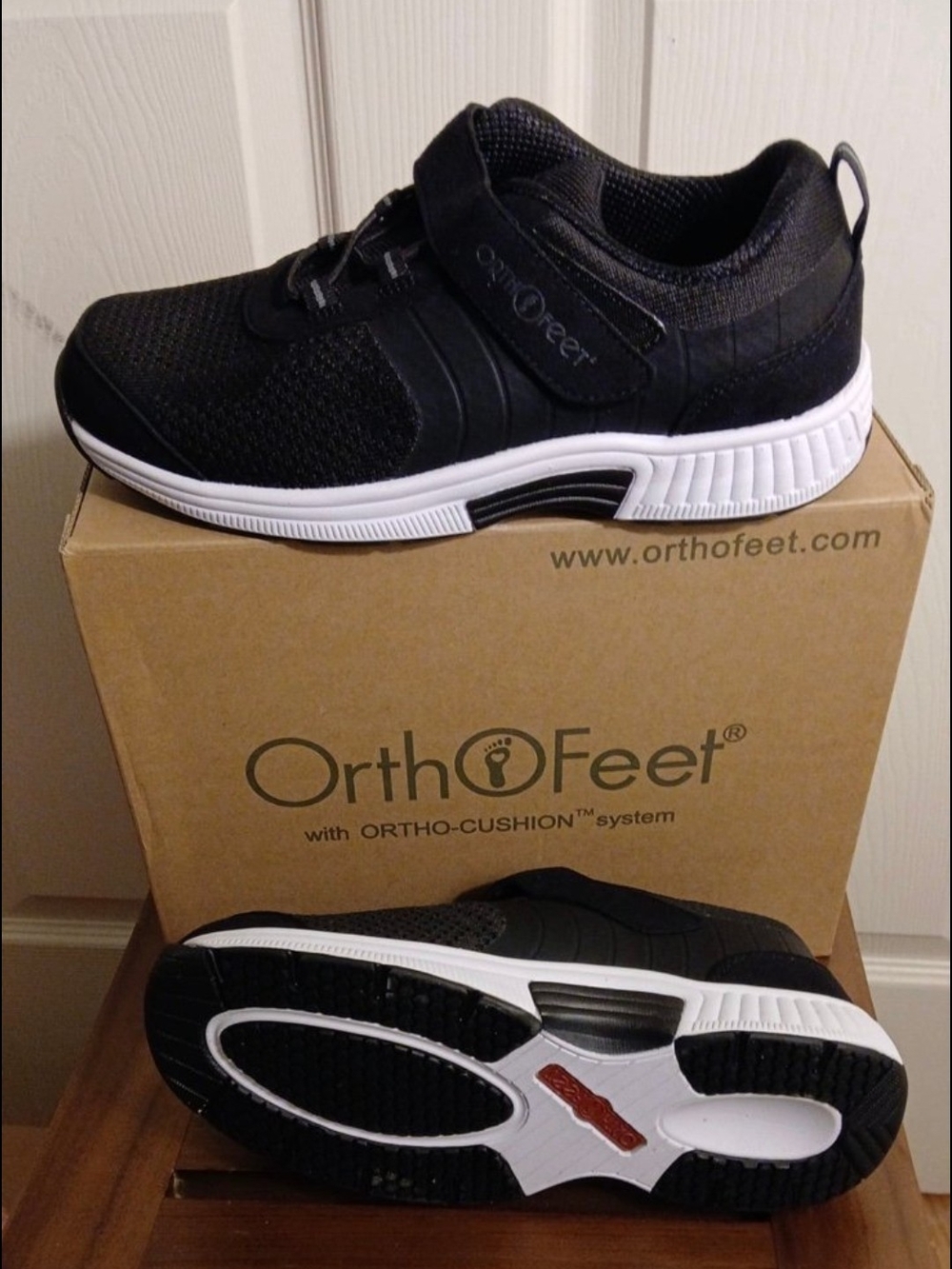 OrthoFeet black athletic shoes with gray accents